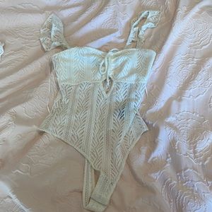 Urban outfitters white body suit. Size S